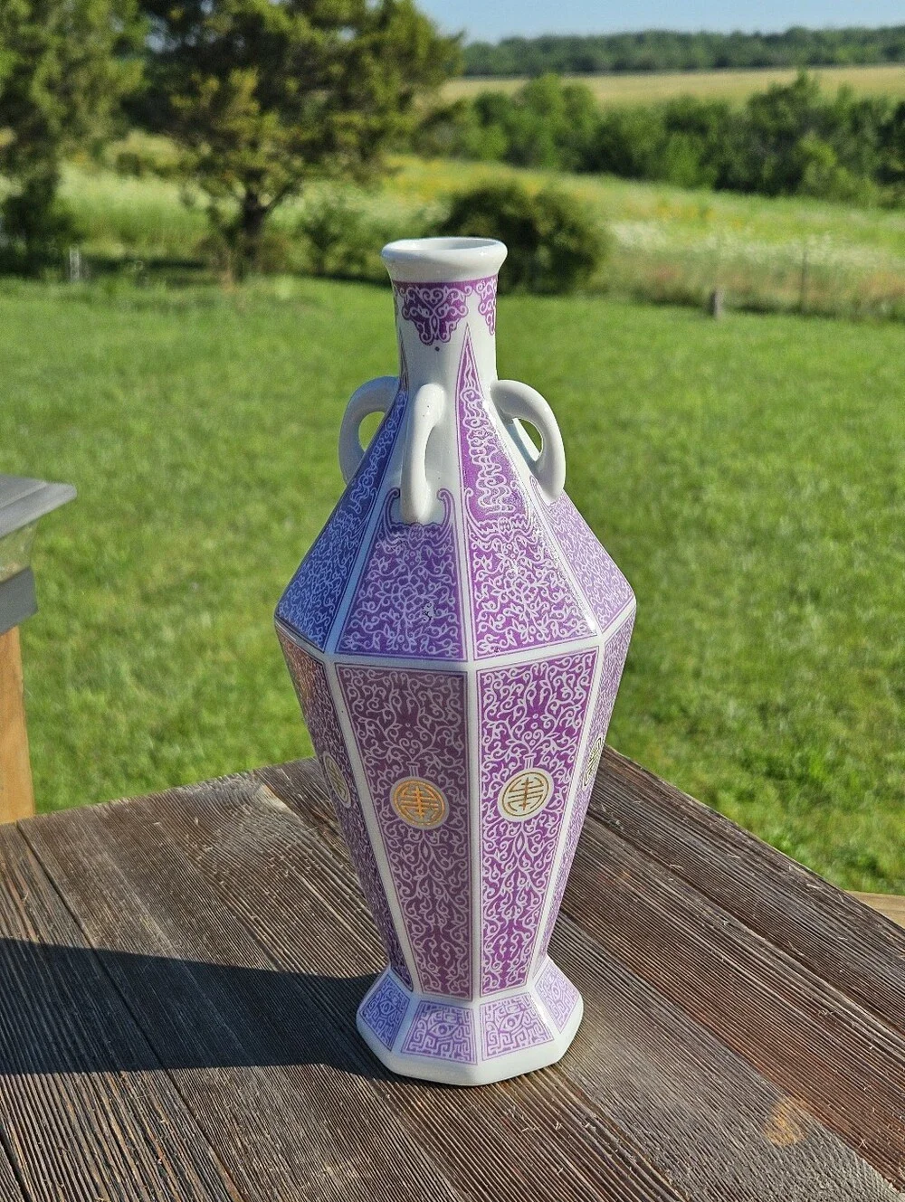 Chinese porcelain vase with purple and white floral and geometric patterns with